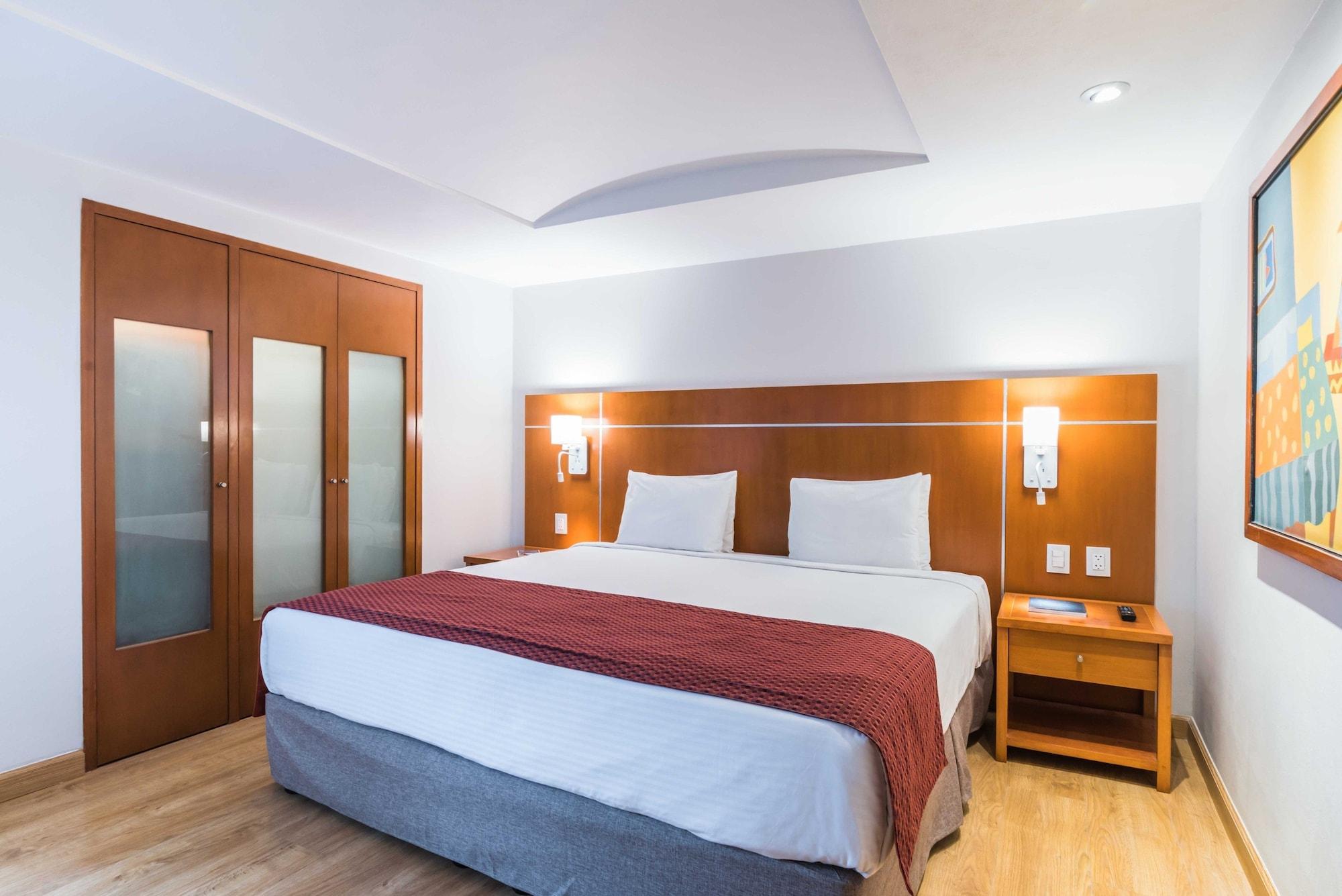 فندق أجنحة يوروستارز زونا روزا مدينة مكسيكو المظهر الخارجي الصورة A bedroom at the hotel