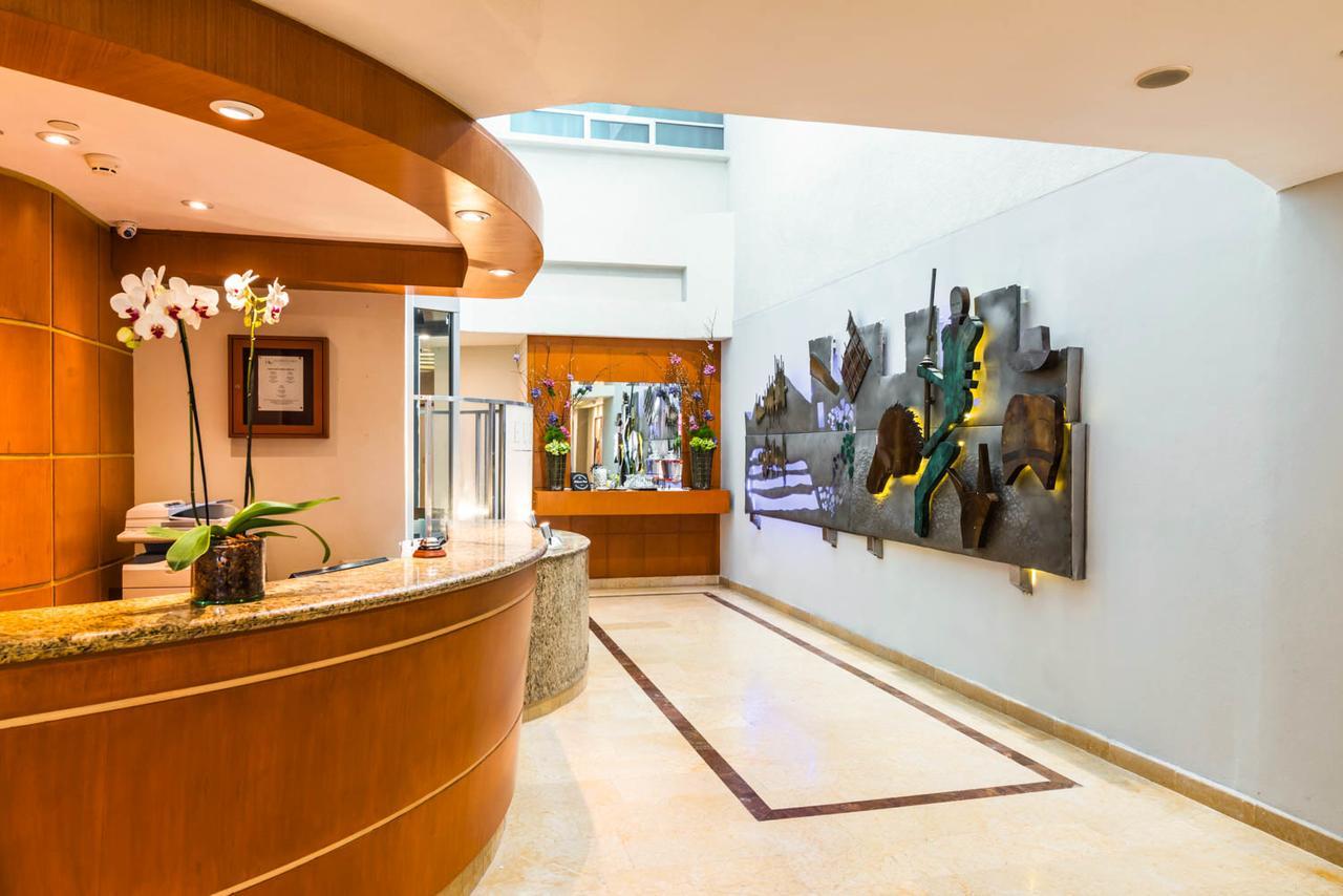 فندق أجنحة يوروستارز زونا روزا مدينة مكسيكو المظهر الخارجي الصورة The lobby of the hotel